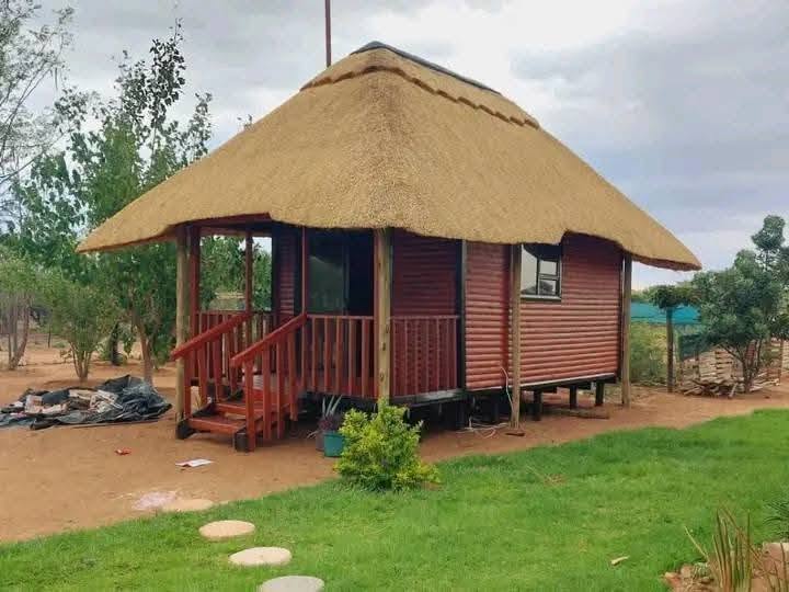Log Cabins project 2 by Hot Mix Holdings